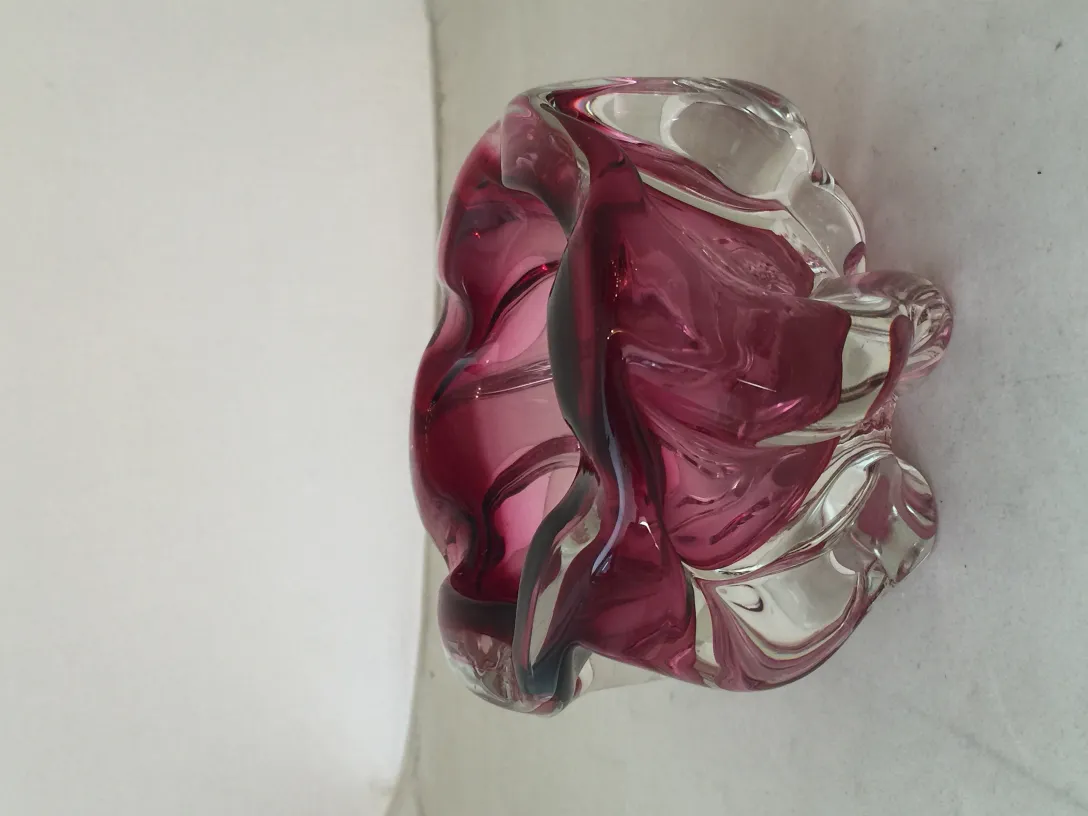 Old Murano glass with pink hues and flowing shapes
