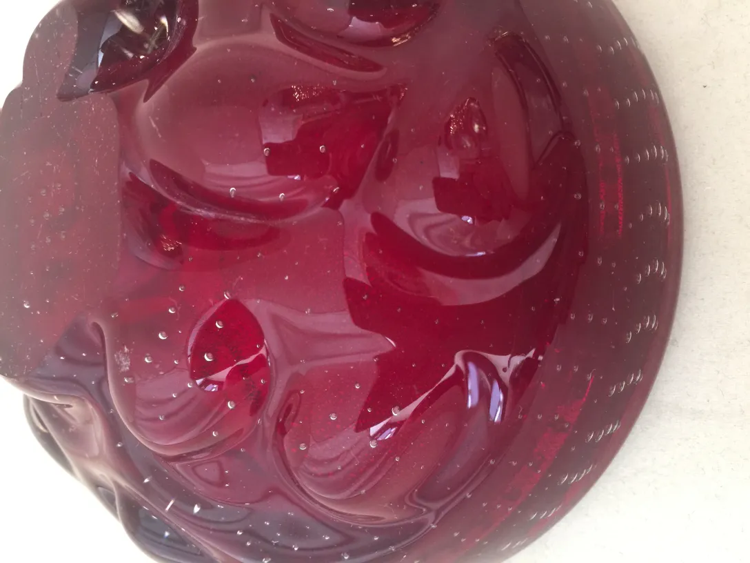 antique murano glass piece featuring red details