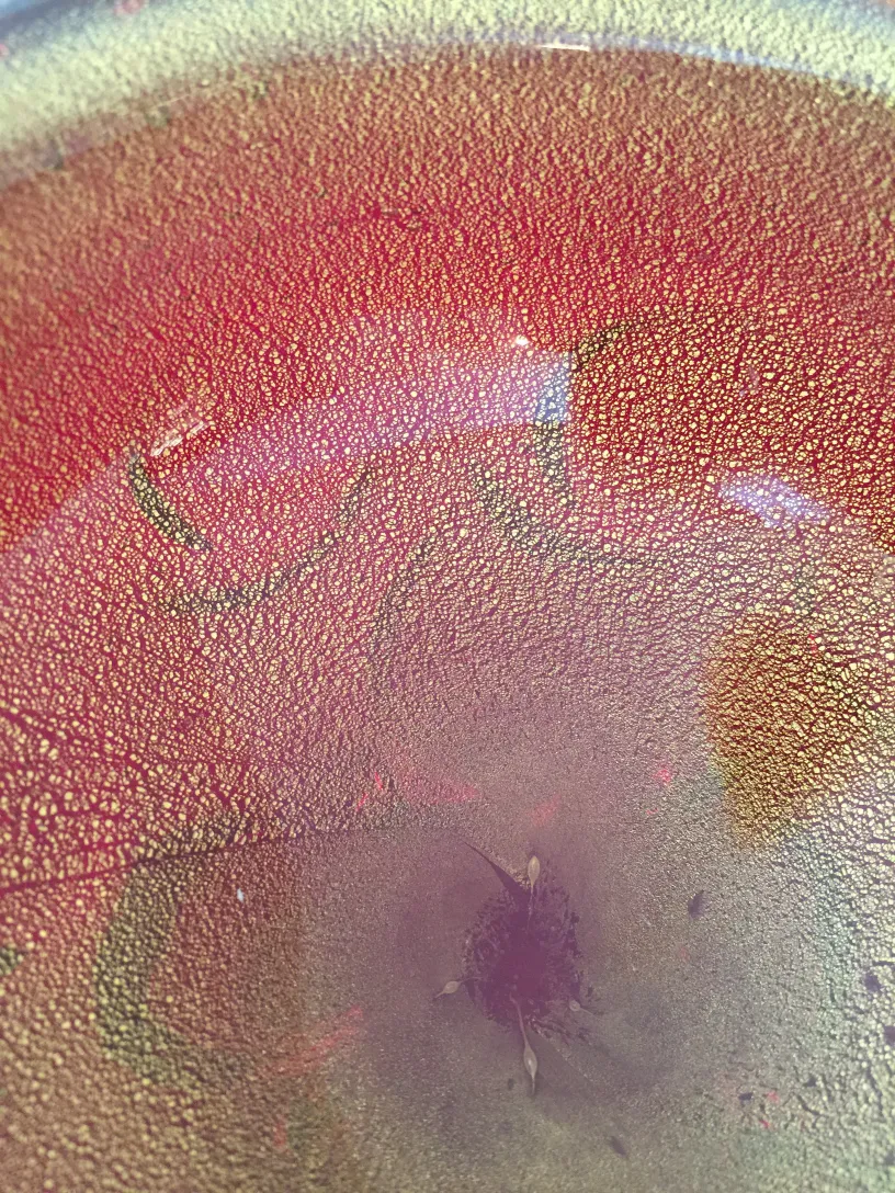 beautiful murano glass with pink and gold hues