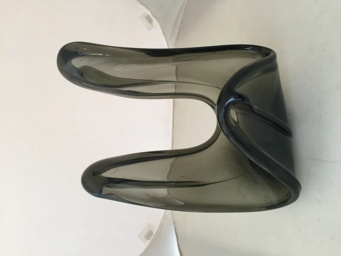 Stunning U-shaped vase, dark gray color, with a smooth finish.