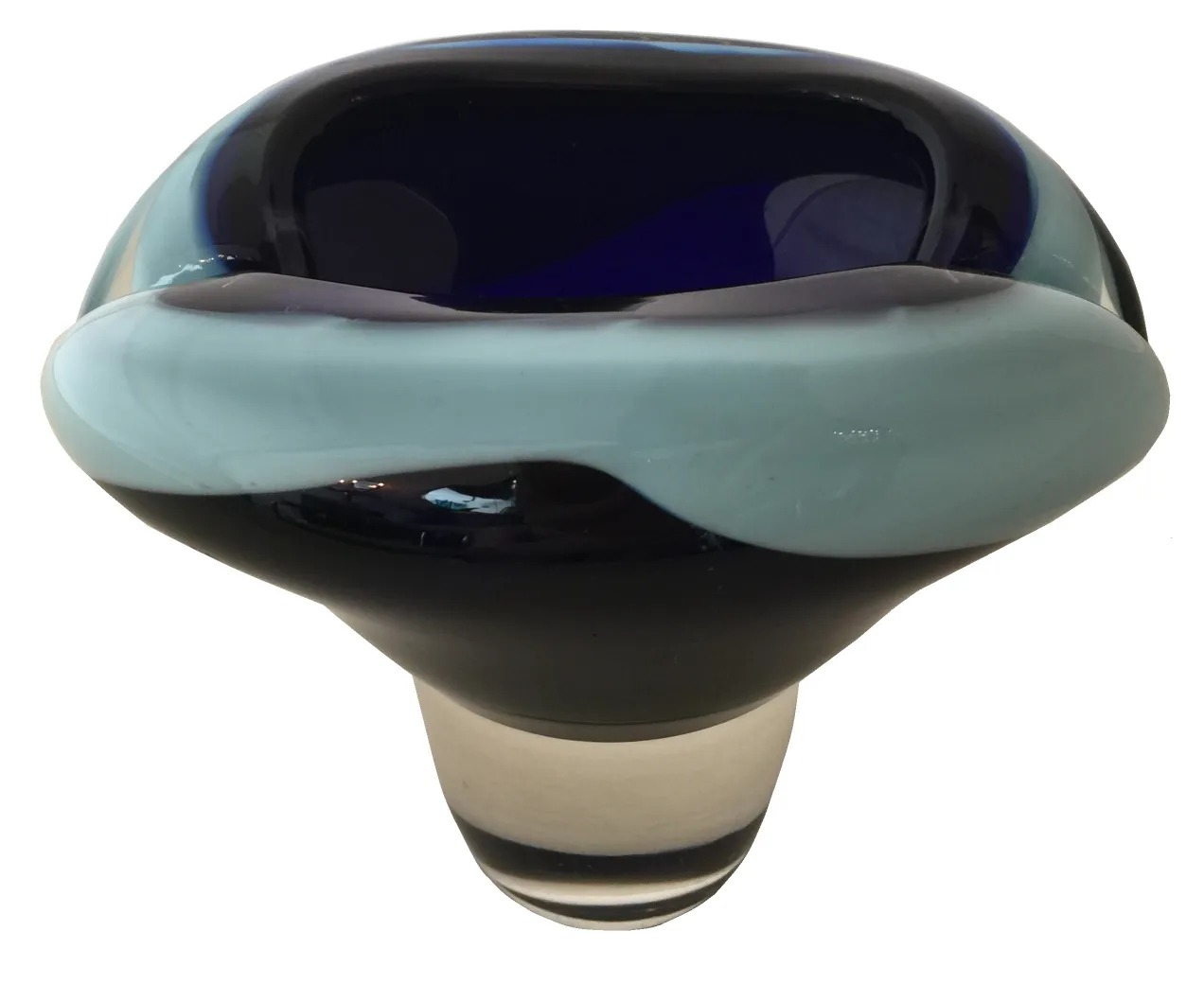 Antique Murano glass piece with wavy shapes and vibrant colors.