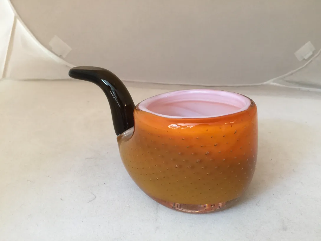 antique murano glass piece with soft shapes and curved edge