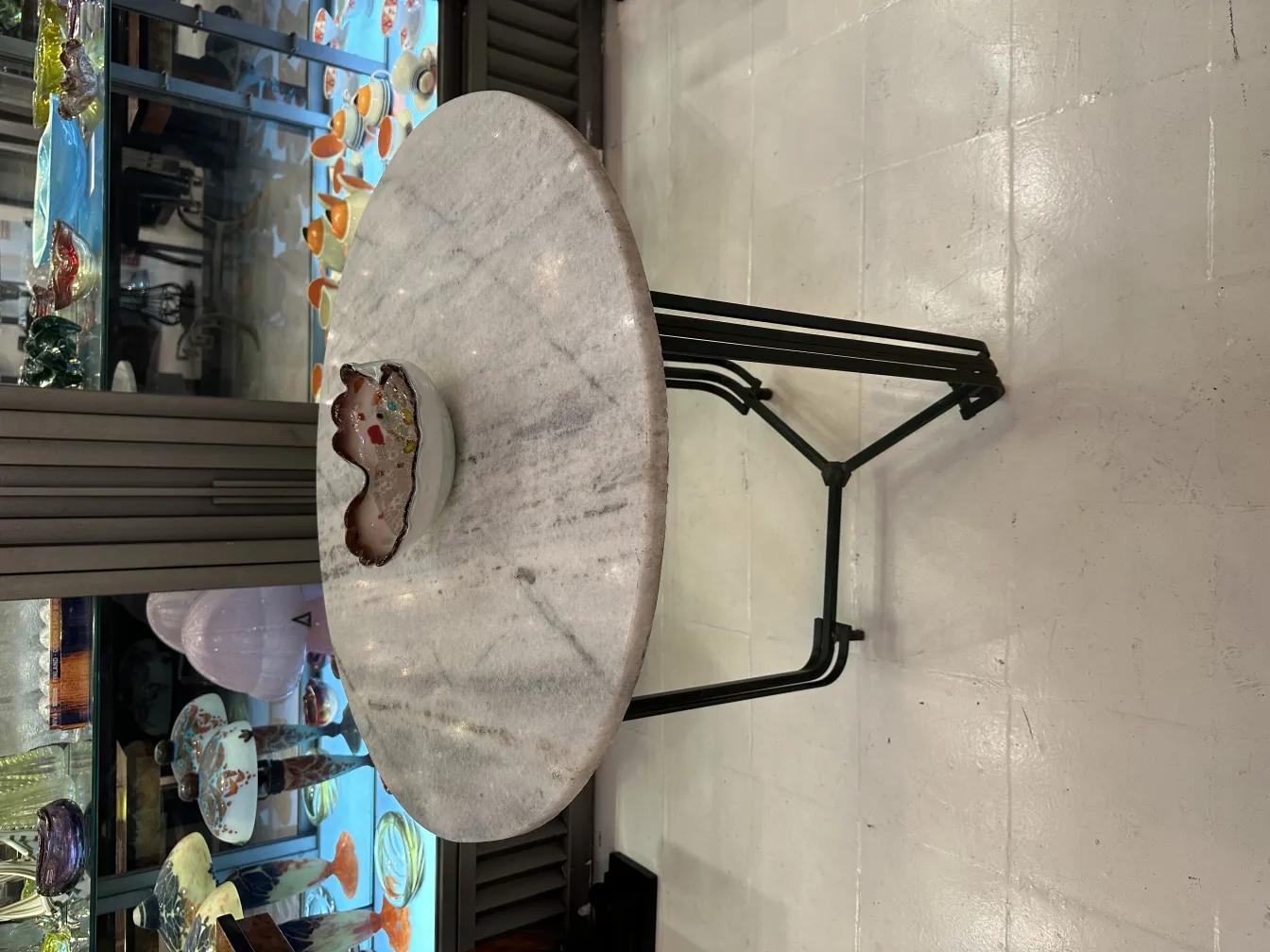 antique murano glass featuring a distinctive shape and colorful finish