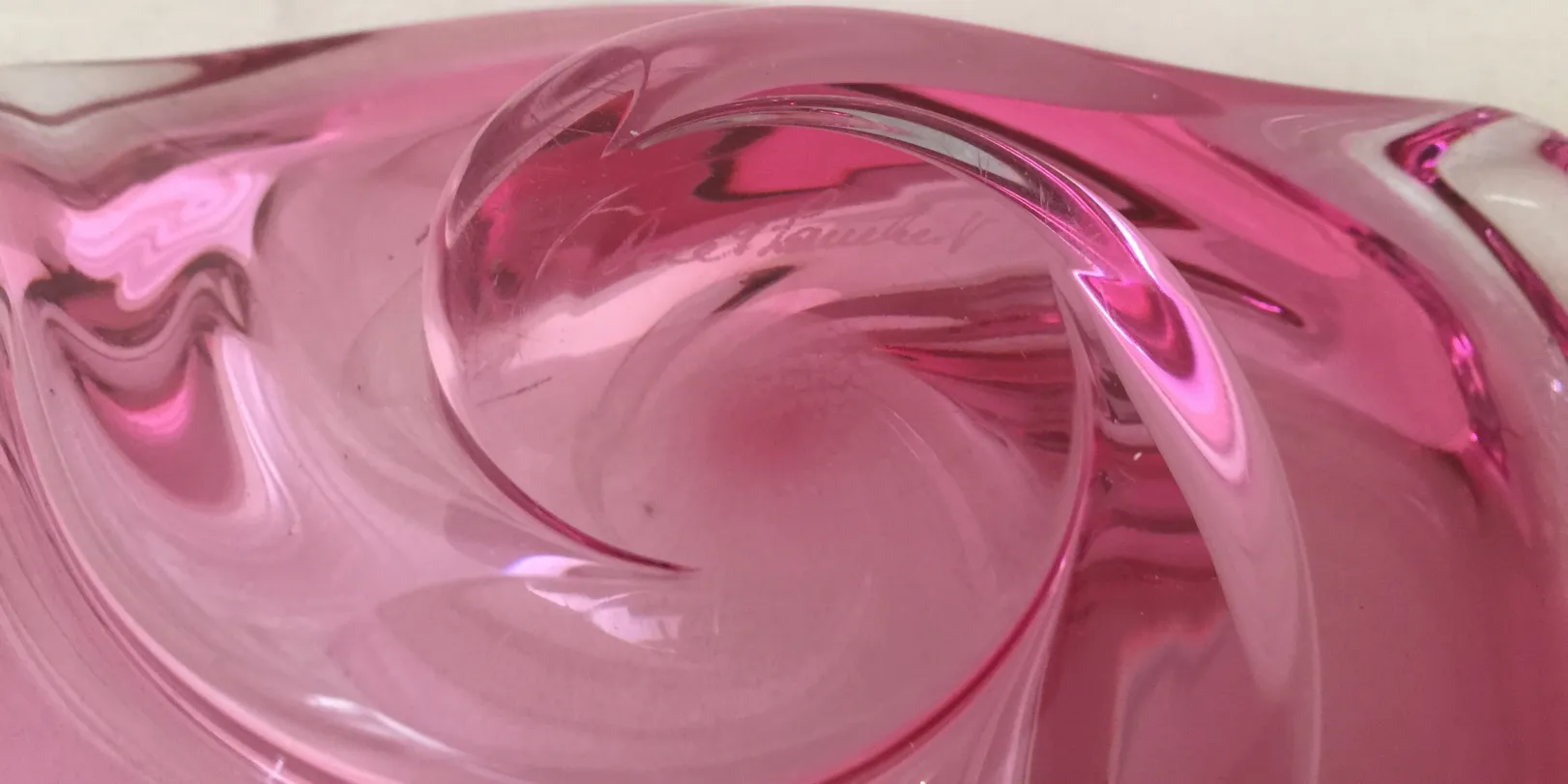 antique murano glass in pink with flowing design
