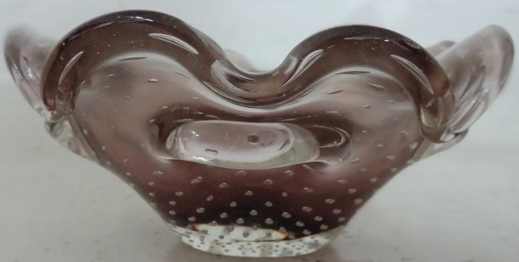 antique murano glass bowl with wavy shape and bubbles