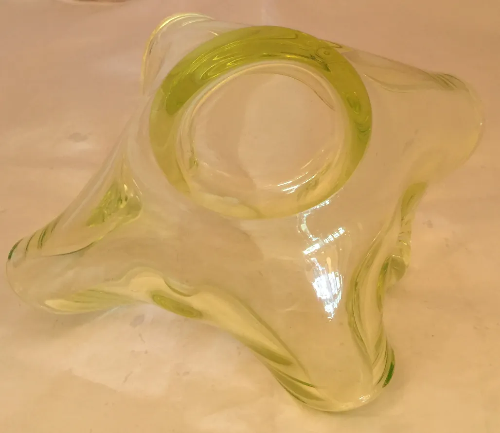 curved antique glass piece in bright yellow color