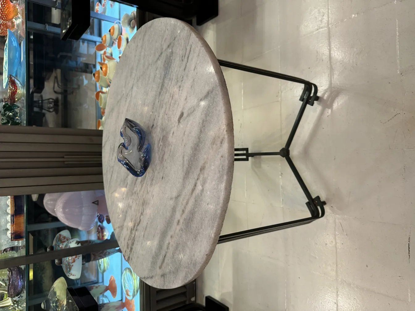 Antique Murano glass with decorative shape on round table