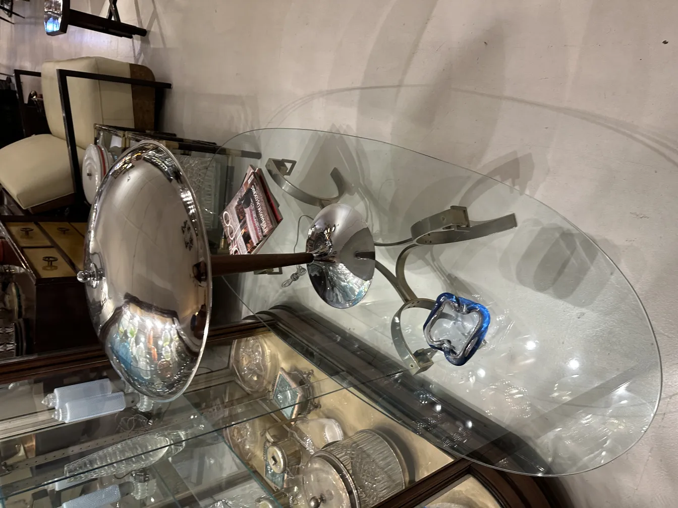 Antique Murano glass with decorative blue and clear details.