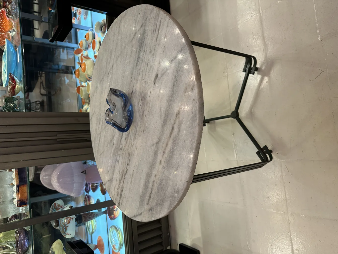 Antique Murano glass on a decorative round table