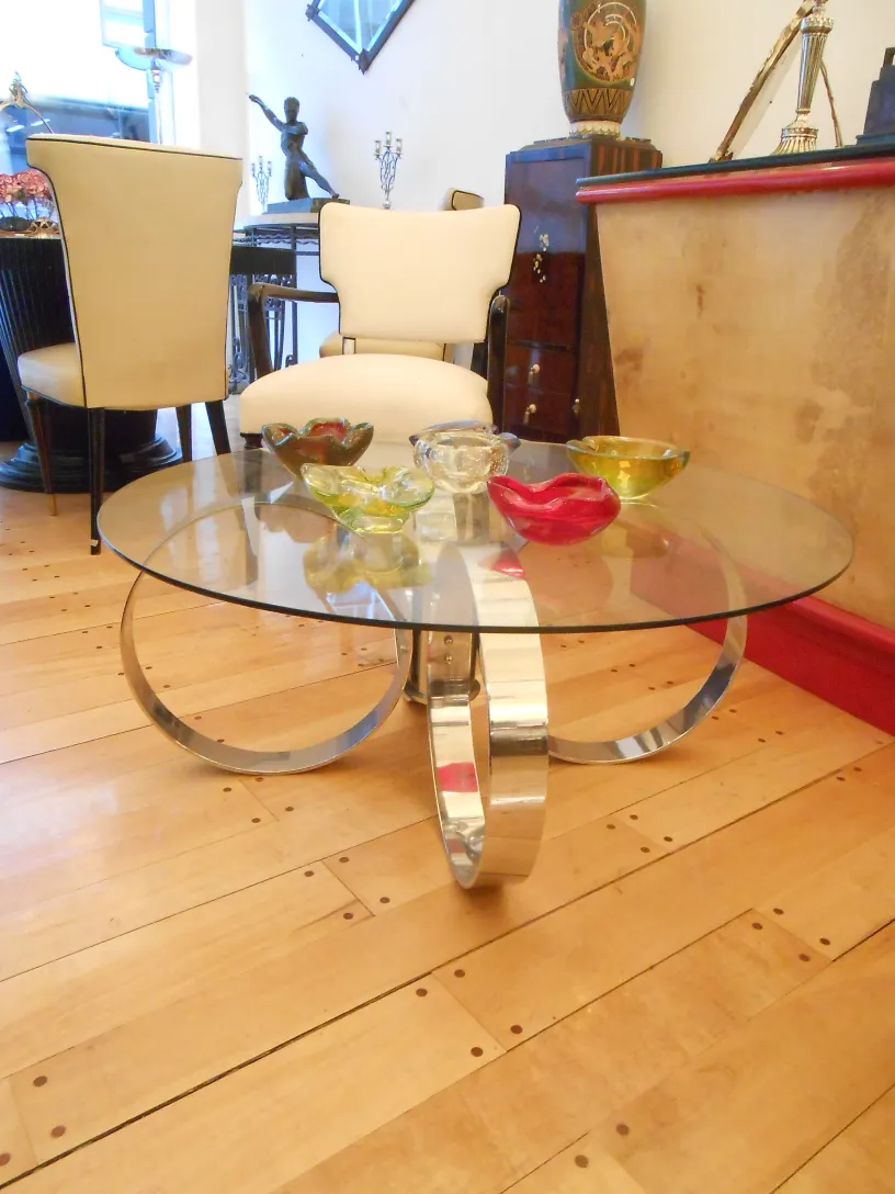 antique murano glass with various shapes and colors on table