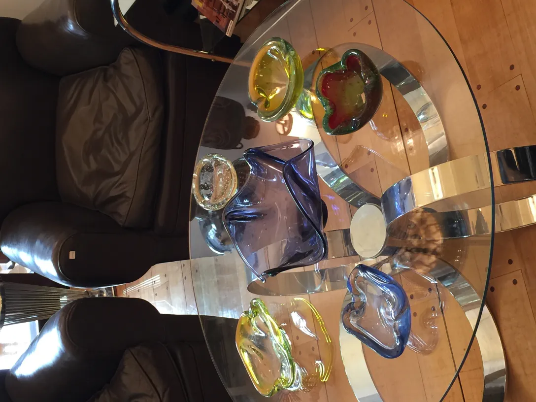 colorful artistic murano glass pieces on table