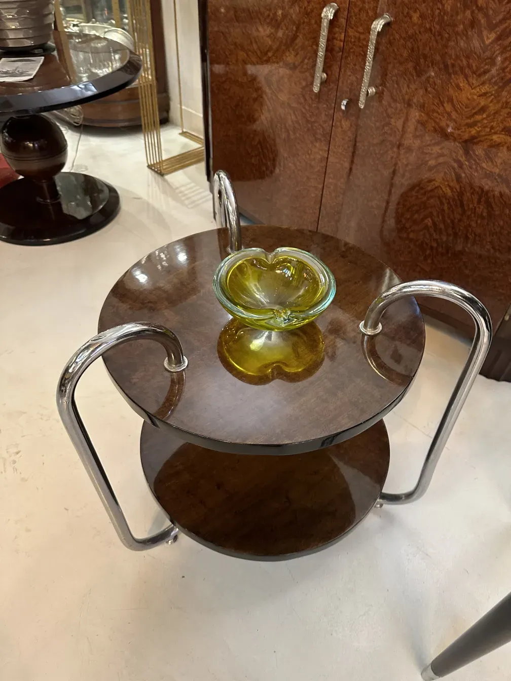 Murano glass with elegant shapes and colors, antique setting.