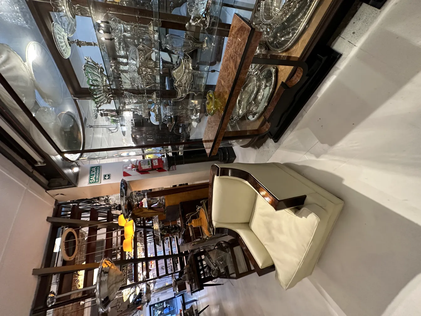 showcases with antique items and colorful glass