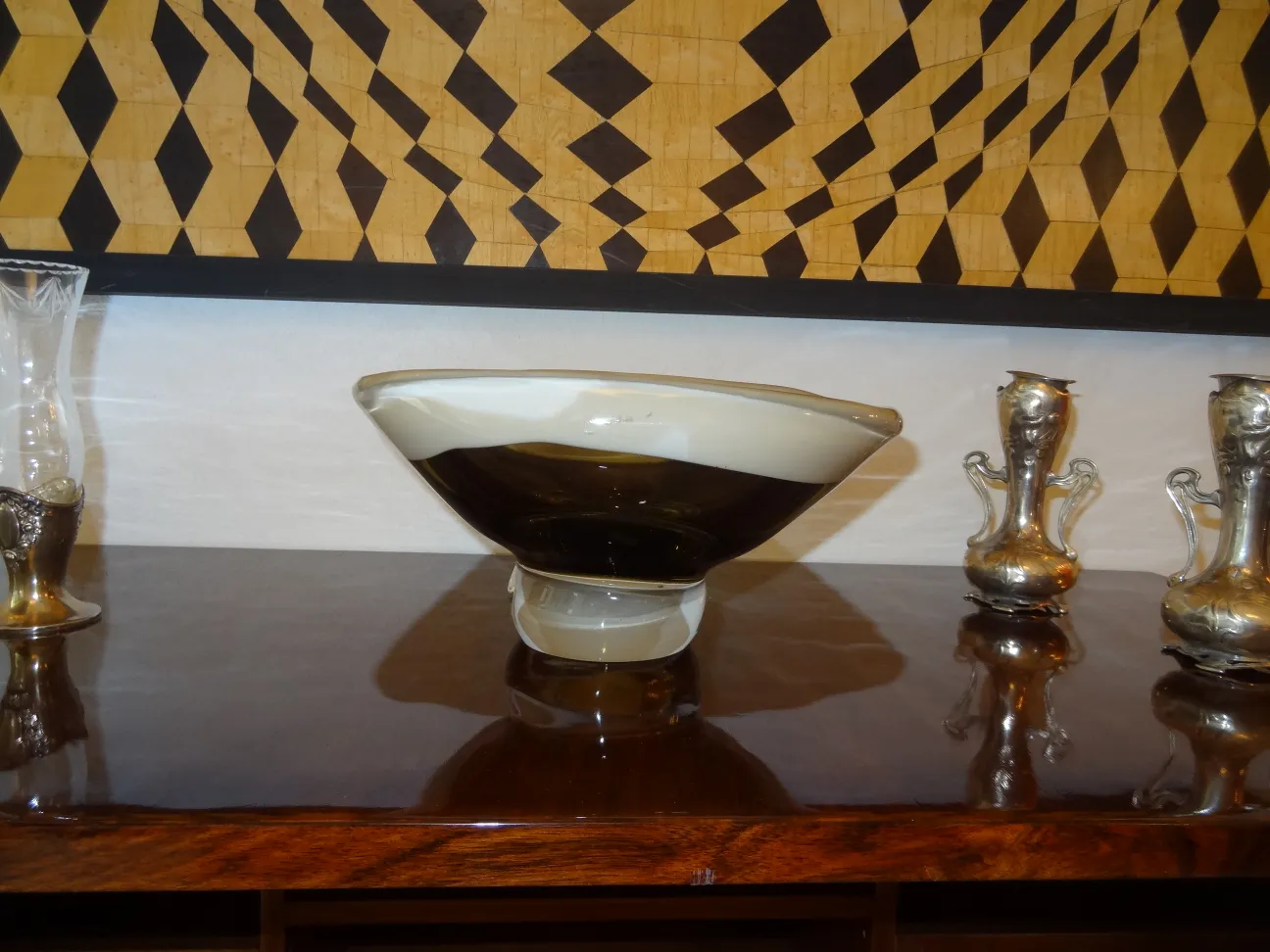 antique murano glass piece in dark tones