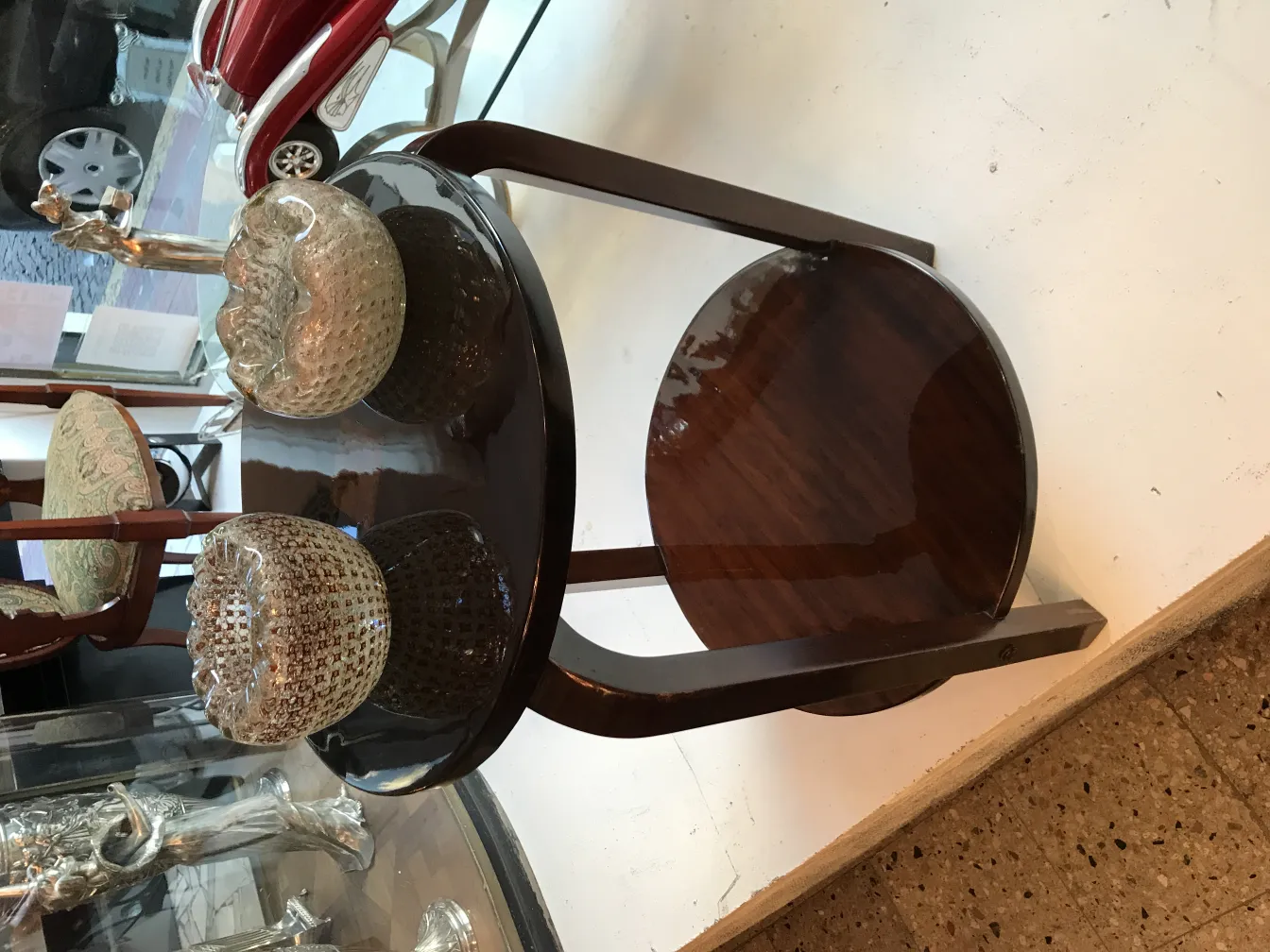 two decorative murano glass vases on a table