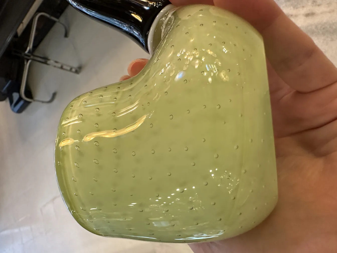 light green murano glass bottle shaped like an apple