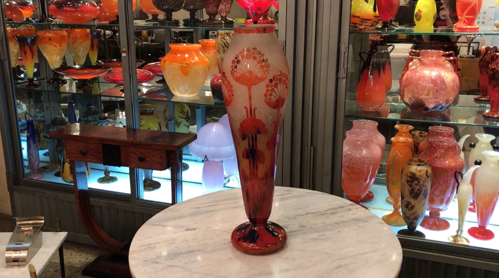 Antique signed glass vase Le Verre, colorful, decorative, displayed alongside other glass items