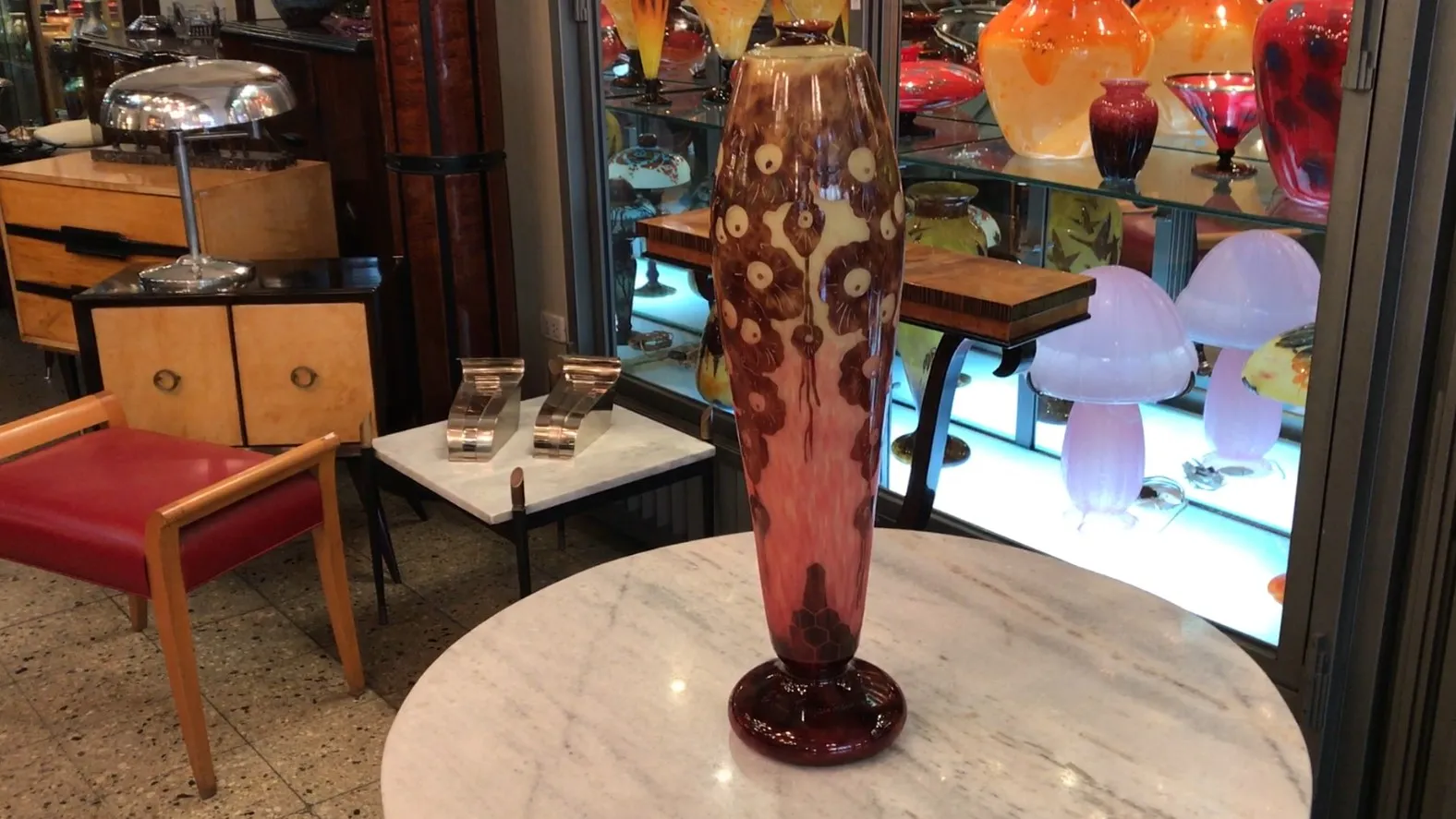 Antique glass from Le Verre, featuring floral designs and soft colors