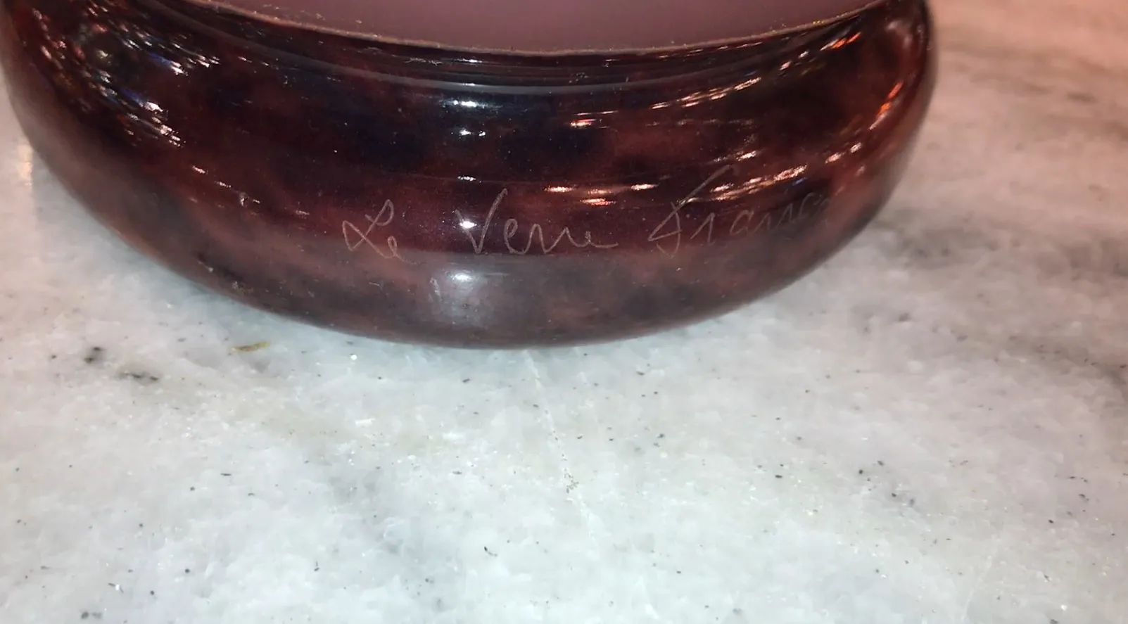 signed glass with subtle details, unique antique