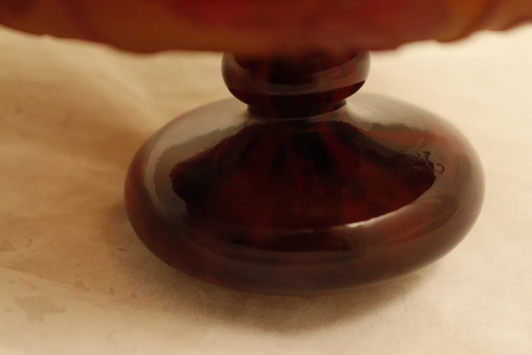 Antique signed glass Le Verre with a round polished base.