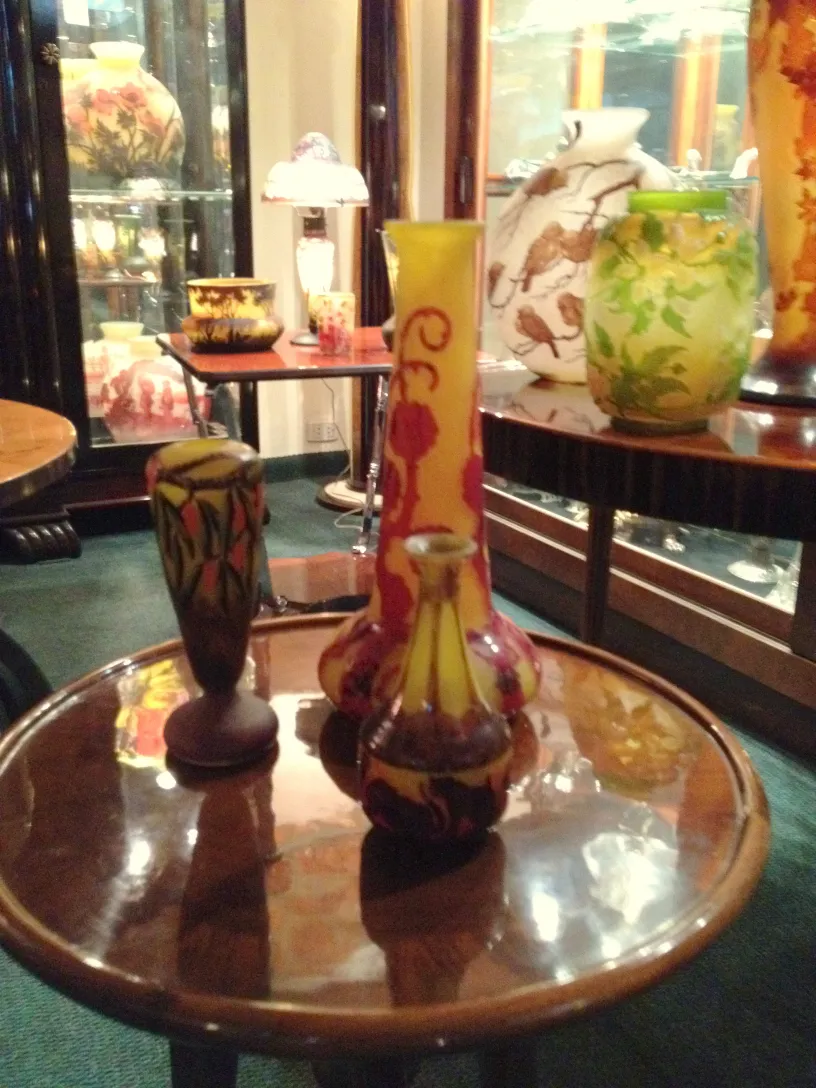 Antique glass with colorful patterns on the table.