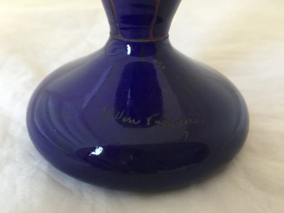 Signed Le Verre glass with blue base, elegant design.