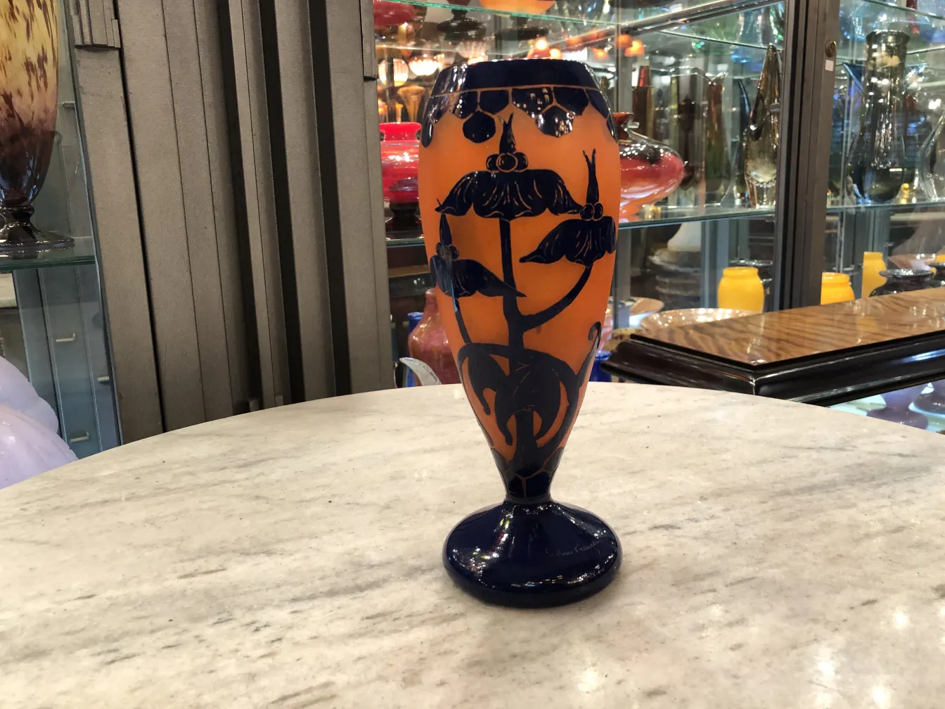 Antique vase made of signed glass Le Verre with floral design.