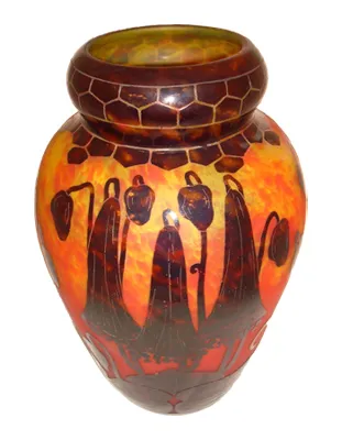 antique decorative vase with floral design in warm tones