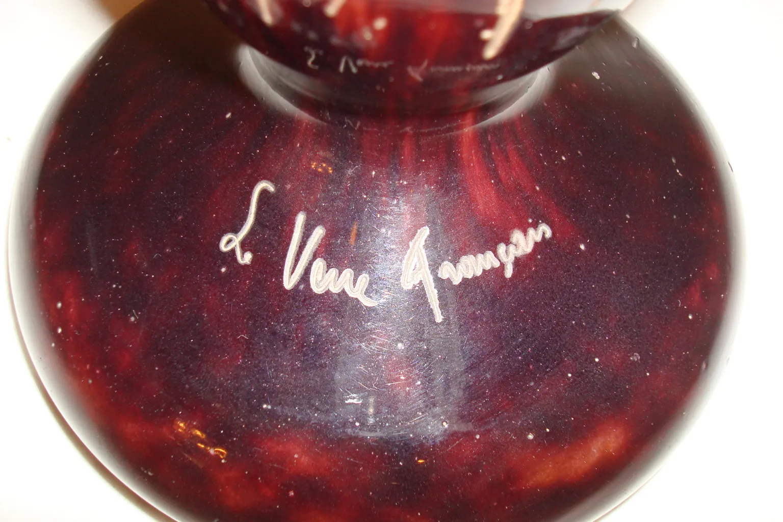 Antique glass with visible signature Le Verre, dark hues and artistic details