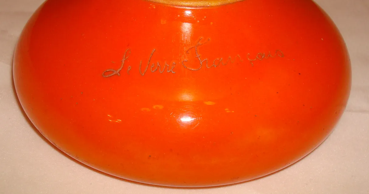 Orange glass with signature from Le Verre, antique design.