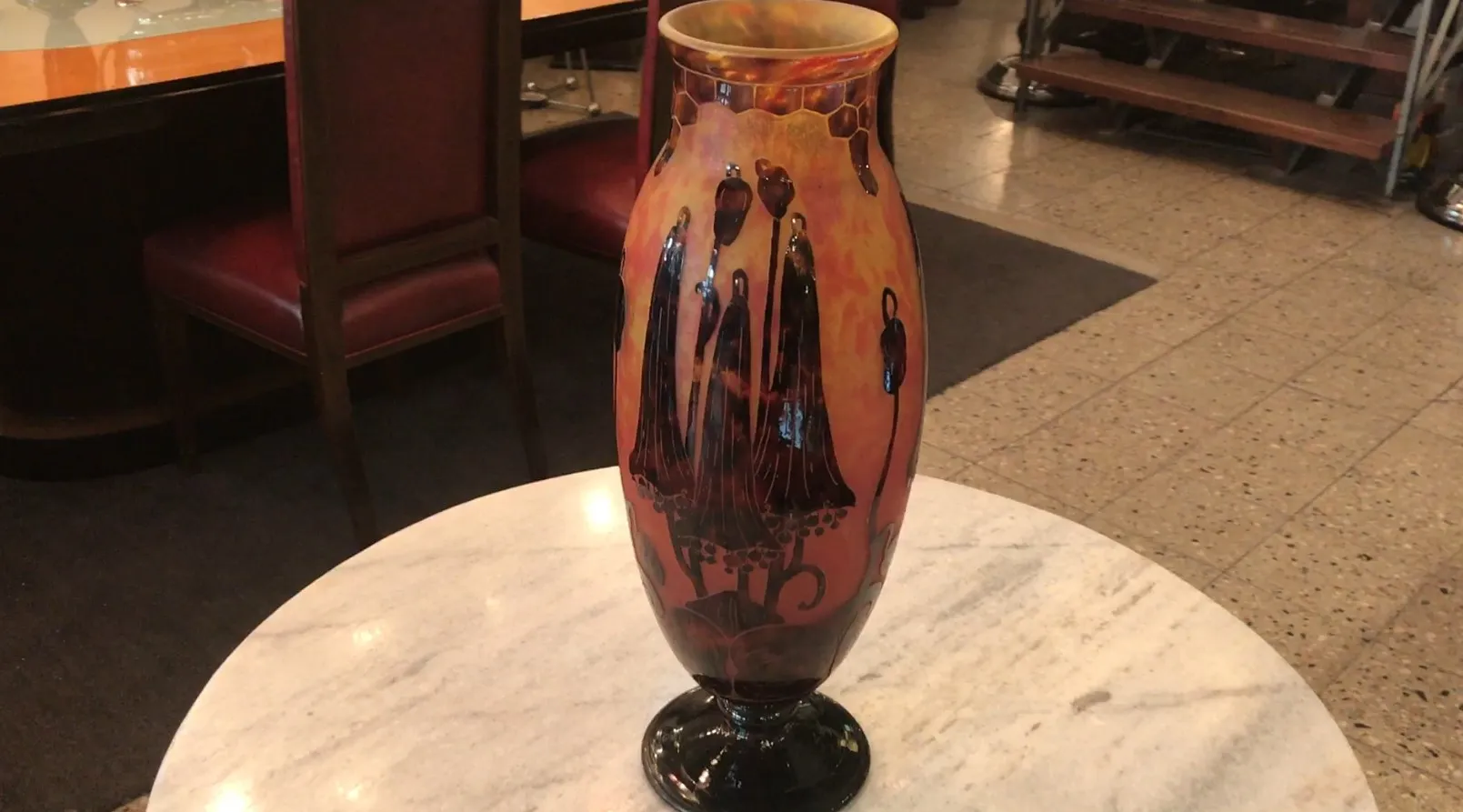 antique glass vase with warm artistic designs