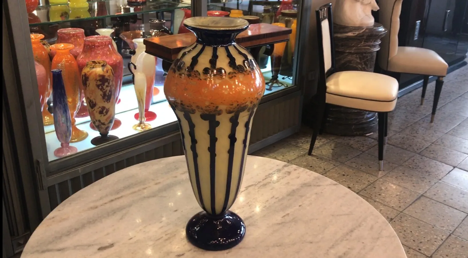 Beautiful antique signed glass Le Verre, featuring decorative patterns and vibrant colors.