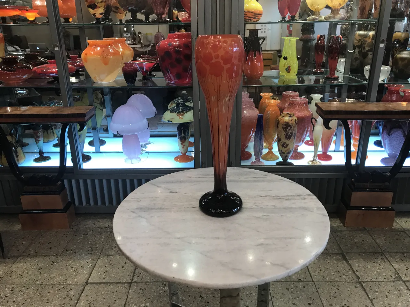 antique signed glass vase on display
