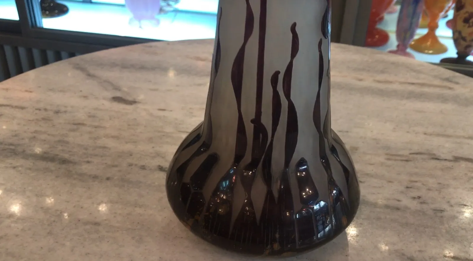 signed glass featuring distinctive design in a cozy setting