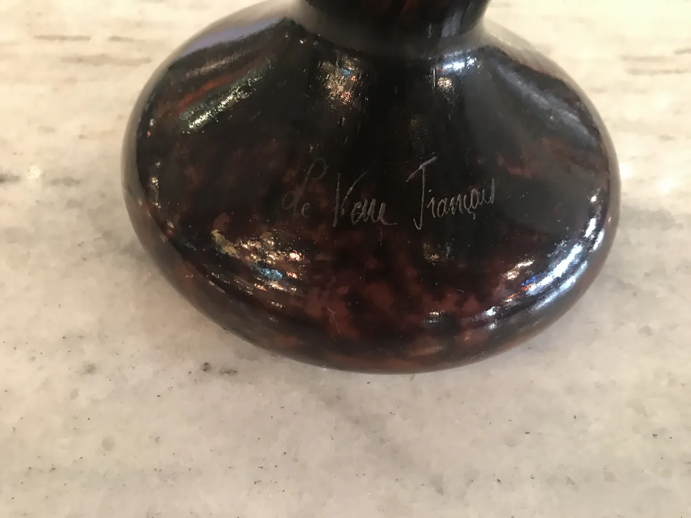 Signed glass with unique details in antique design.