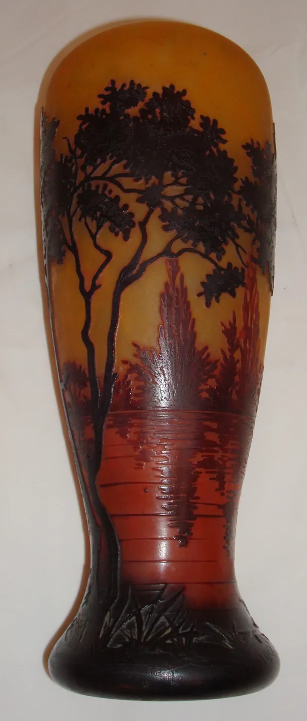 antique daum nancy glass featuring carved landscape