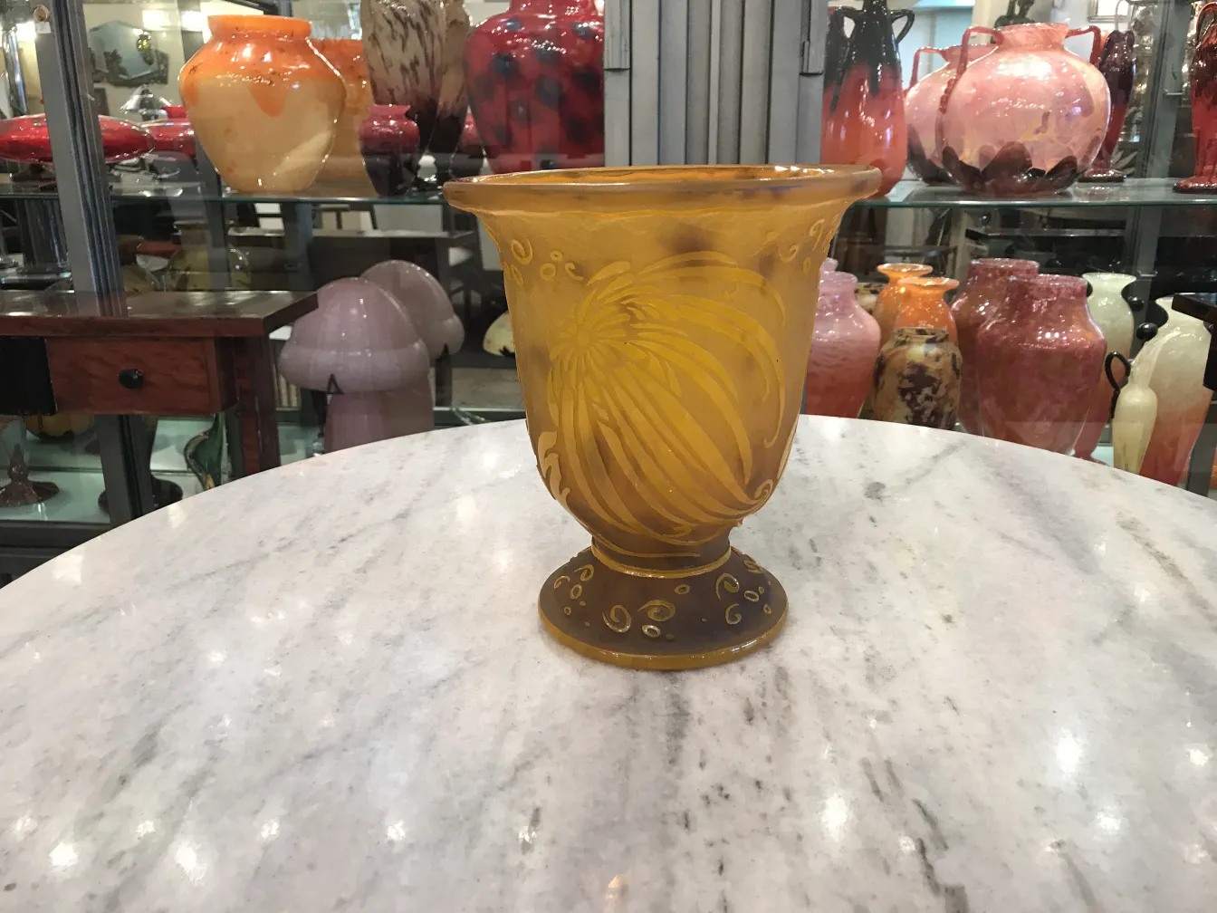 signed glass vase daum nancy in a vintage display