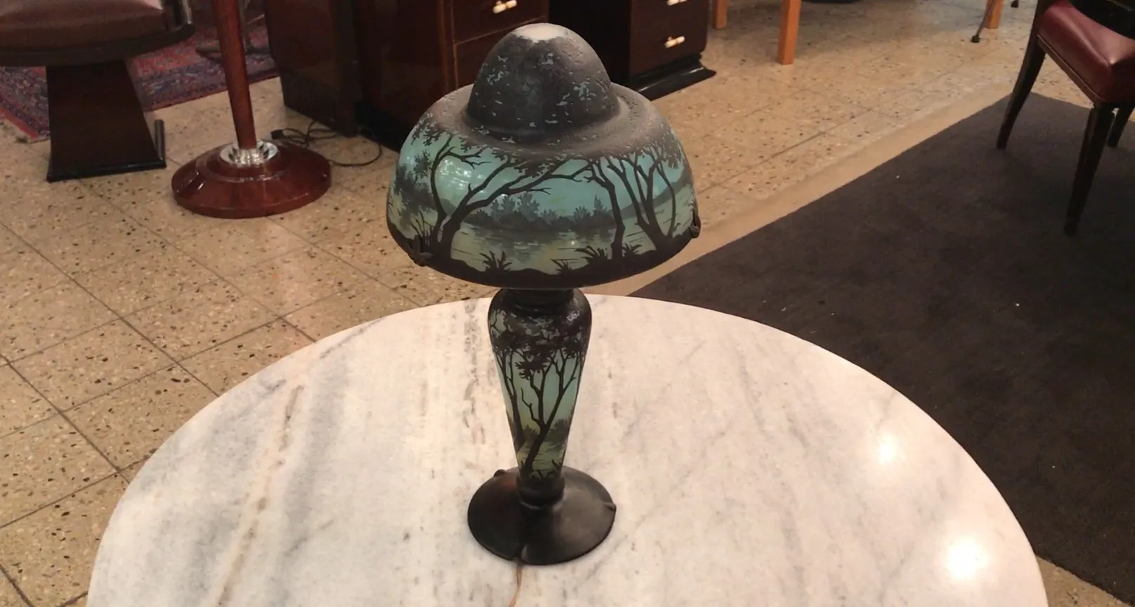 antique lamp with signed glass Daum Nancy, dark background