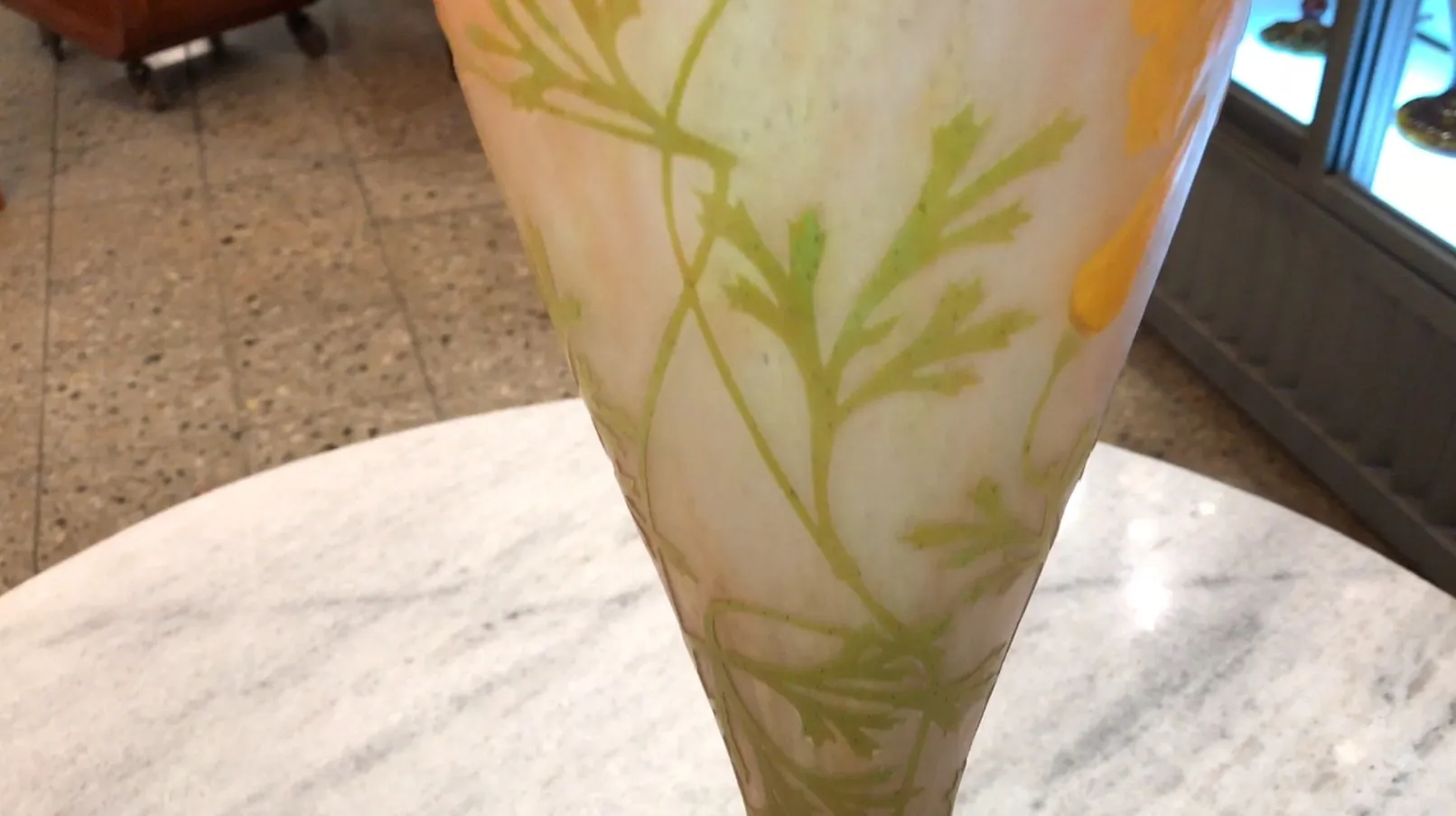 Antique vase with signature, decorations in yellow and green.