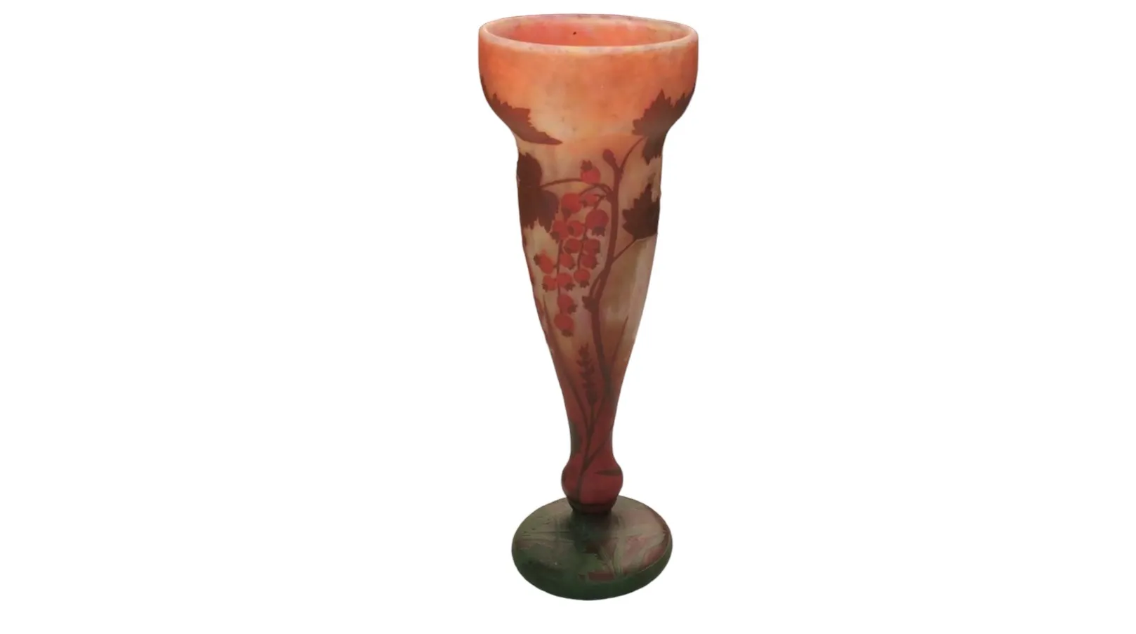 signed glass with foliage design, green base