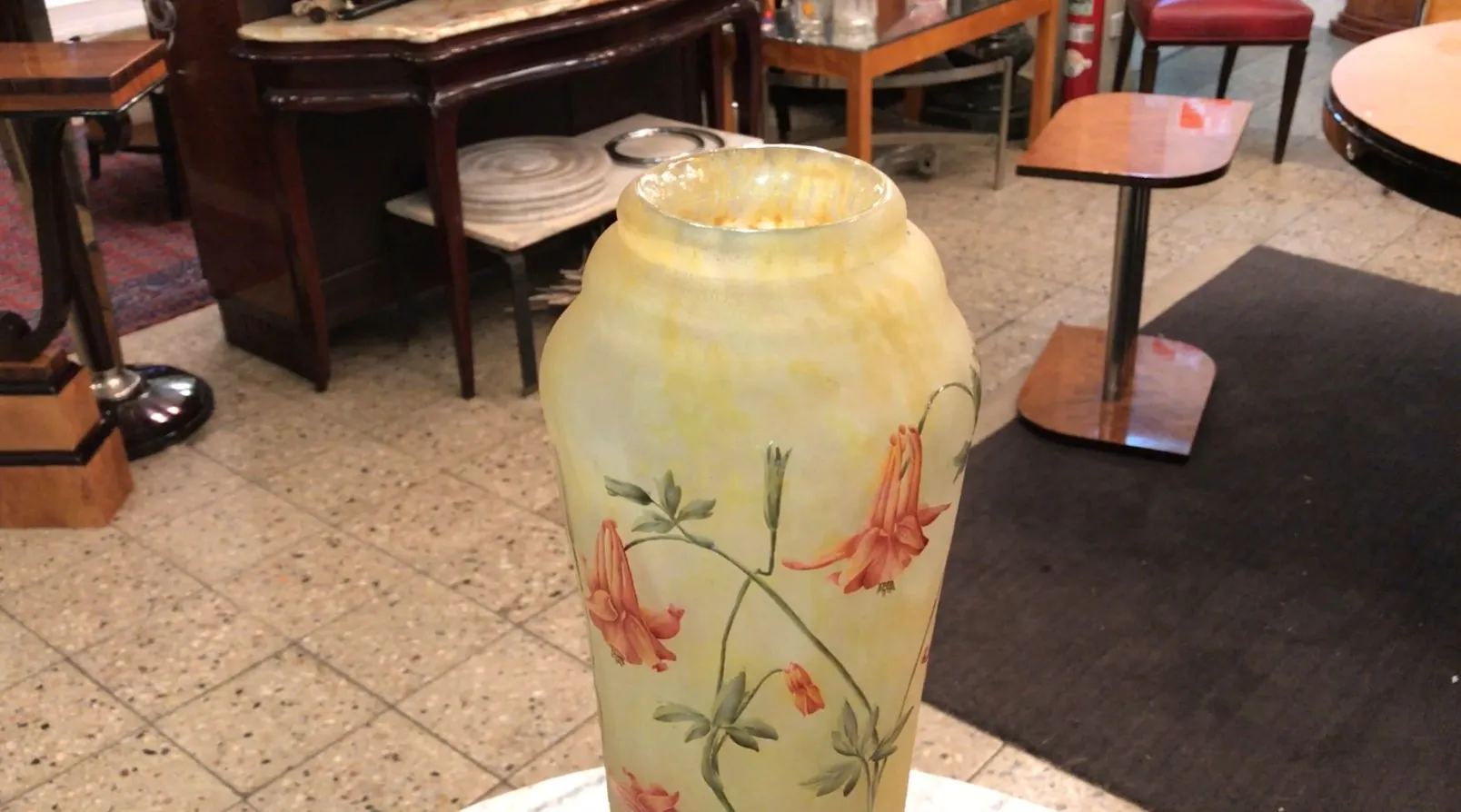 signed glass with floral decoration in soft tones