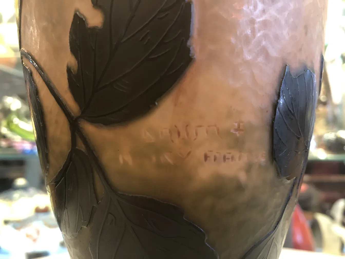 signed glass with leaf design, notable antique
