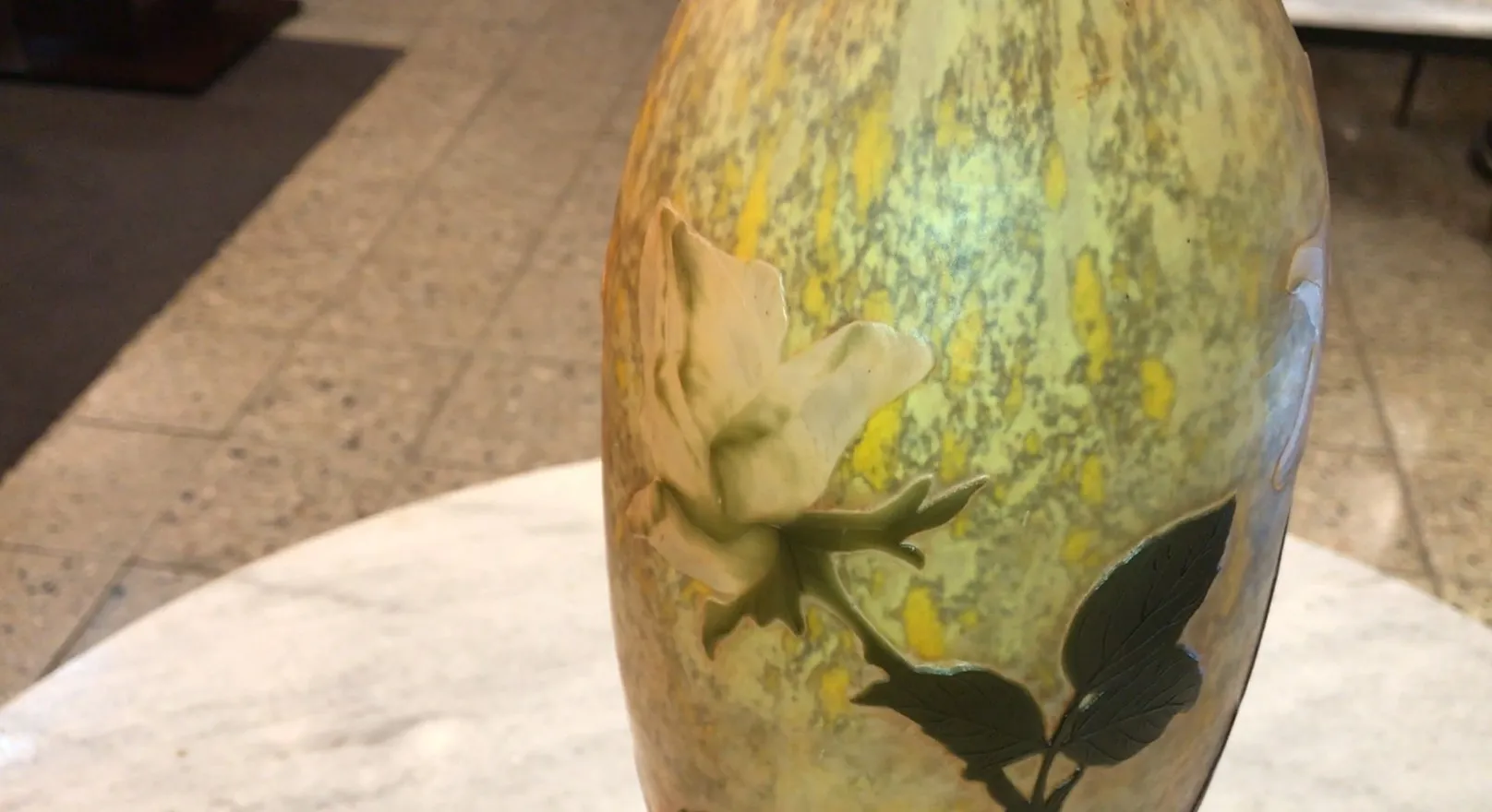 Signed Daum Nancy glass with flower and leaves, antique in yellow and green.