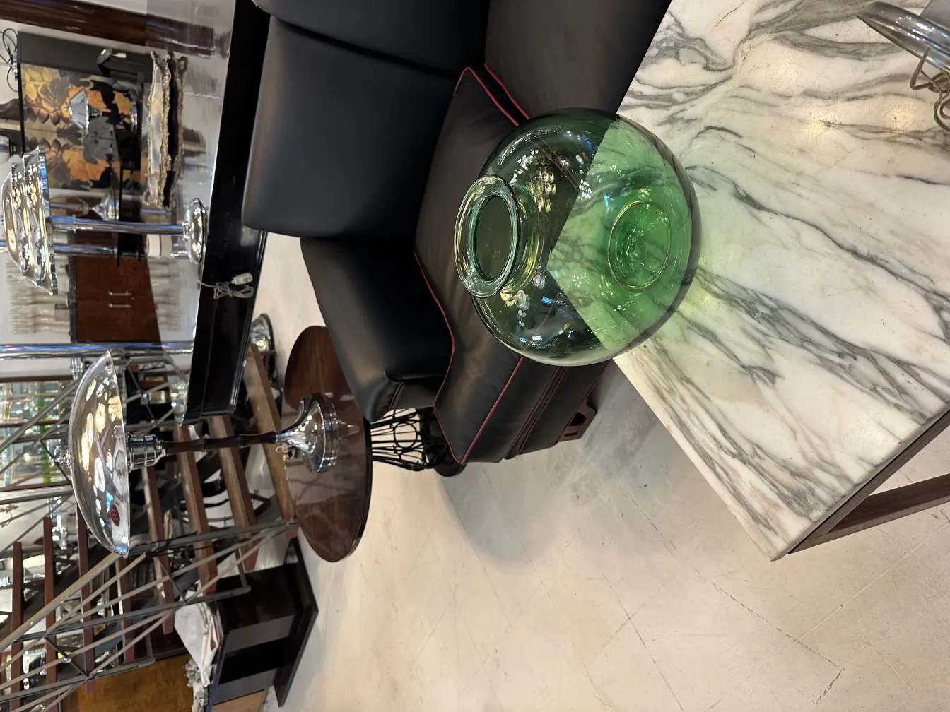 An elegant signed glass by Daum Nancy in an antique setting.