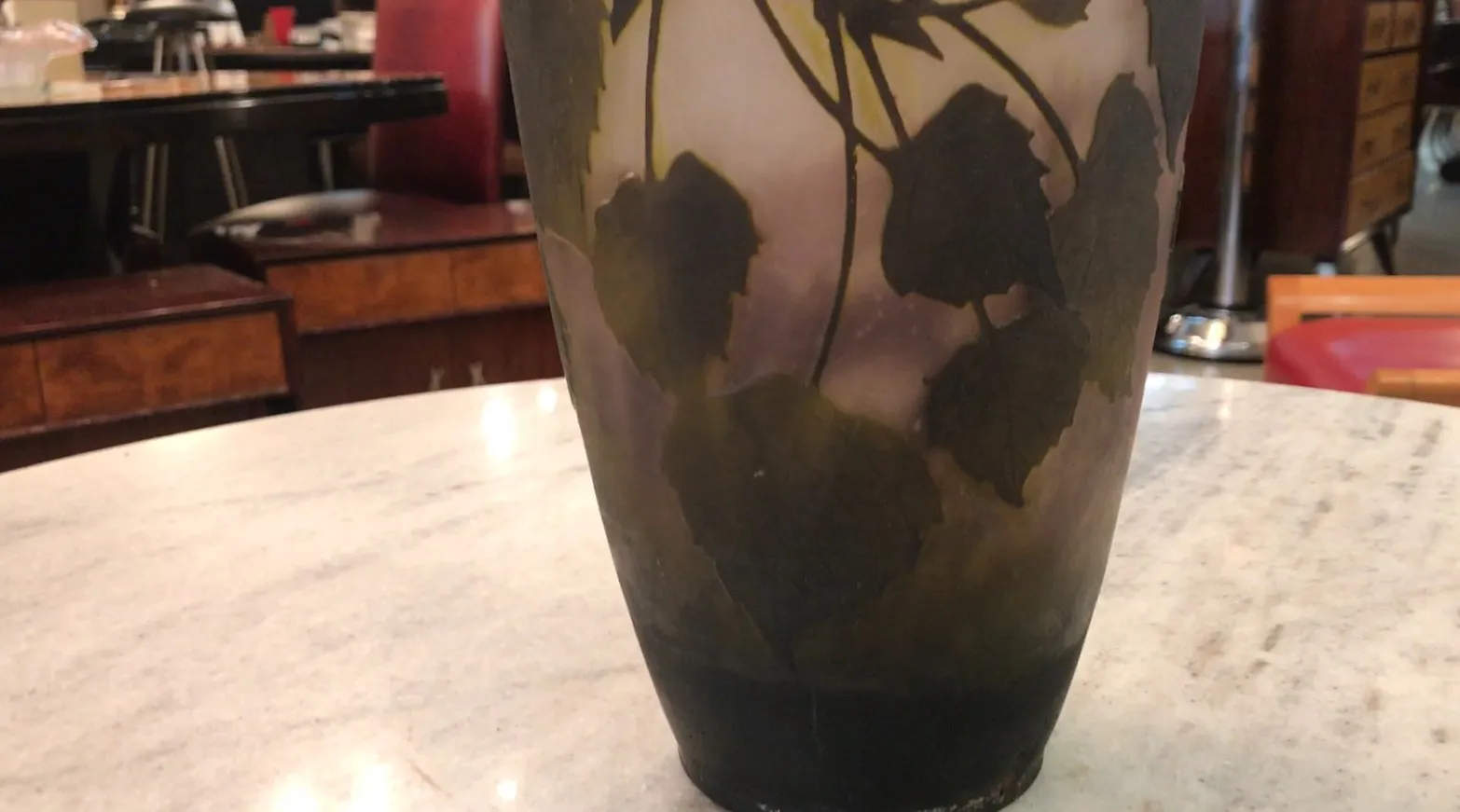 Signed Daum Nancy glass with leaf design, antique setting.