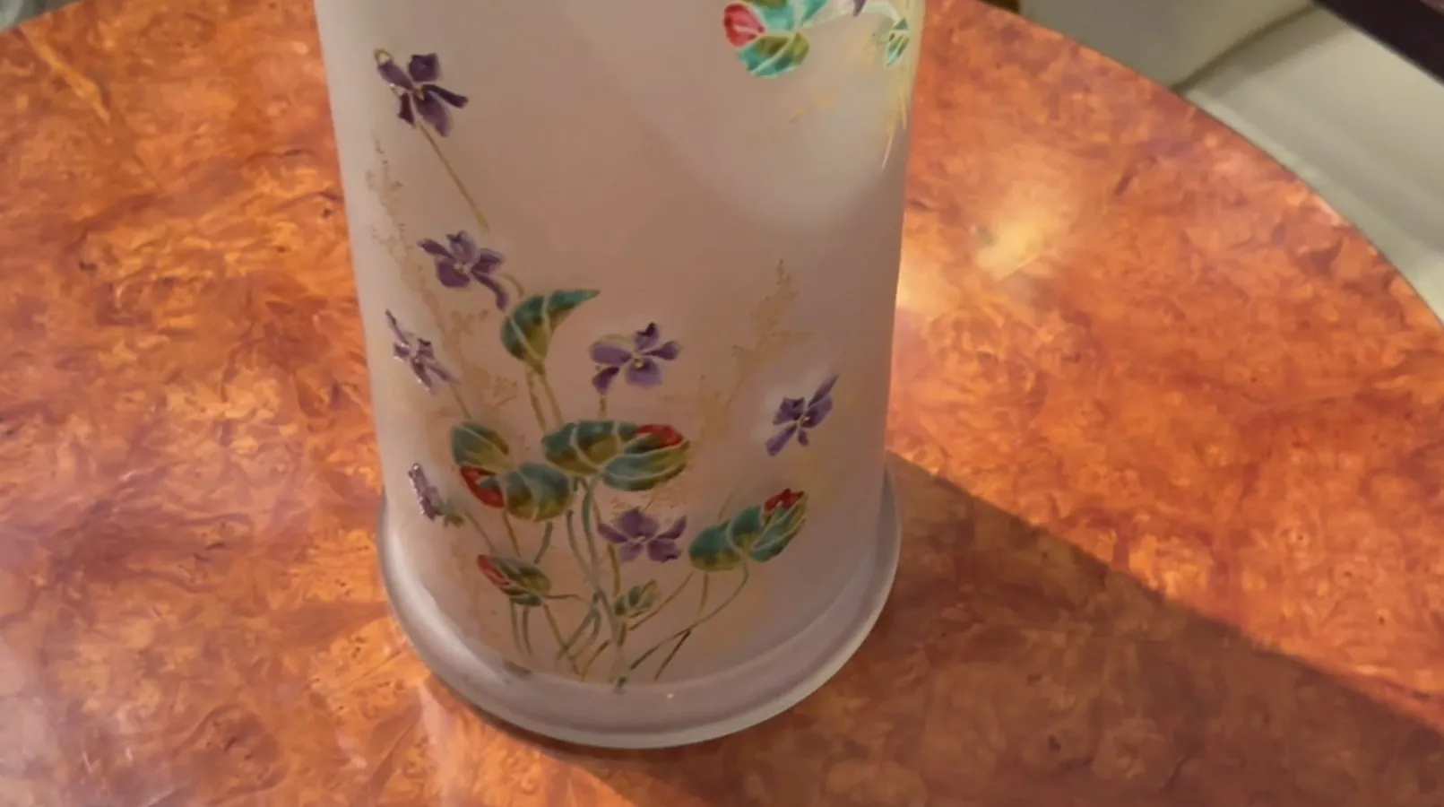 signed glass by Daum Nancy featuring colorful flowers and leaves