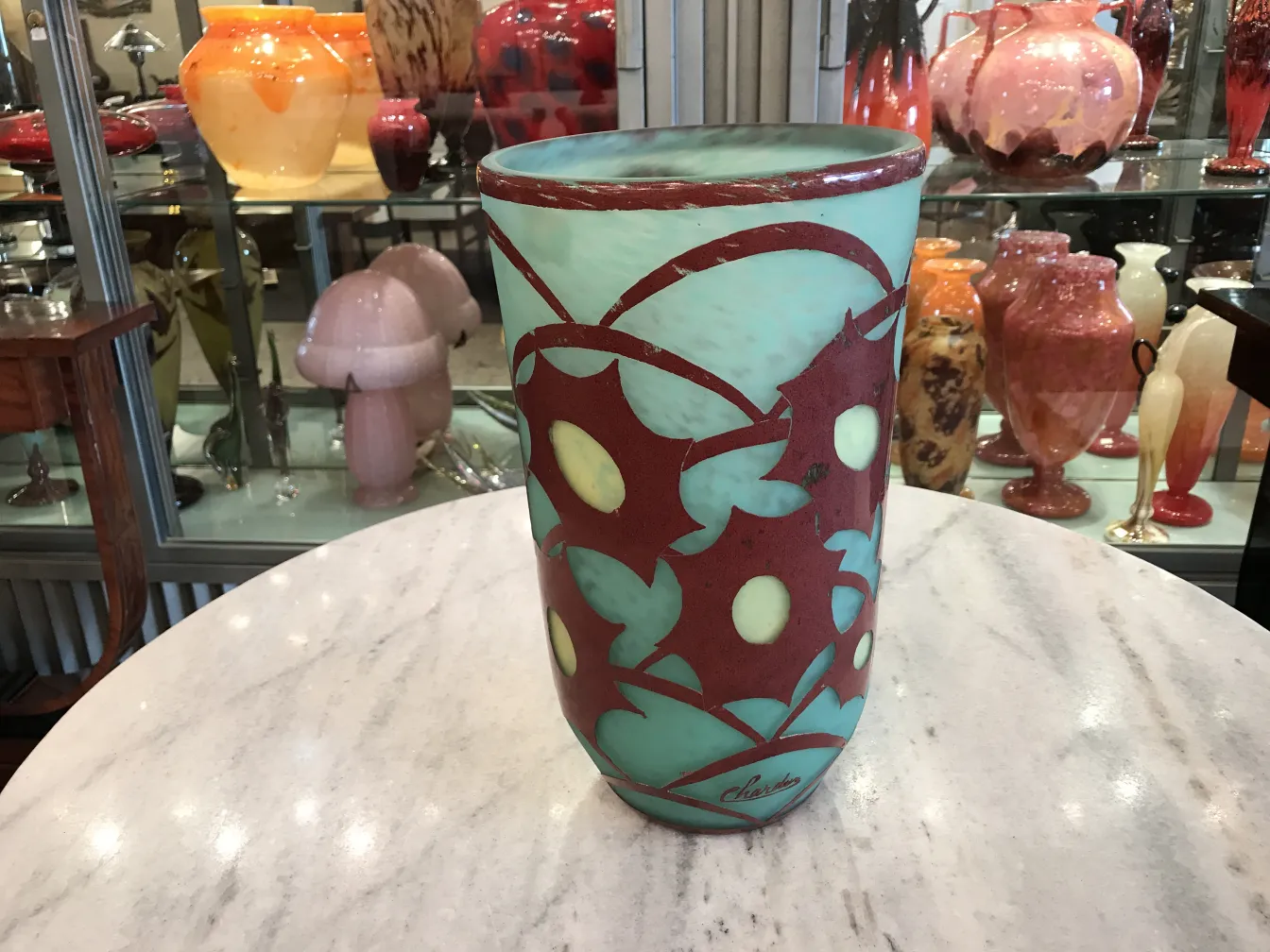 signed glass in green and red with floral design