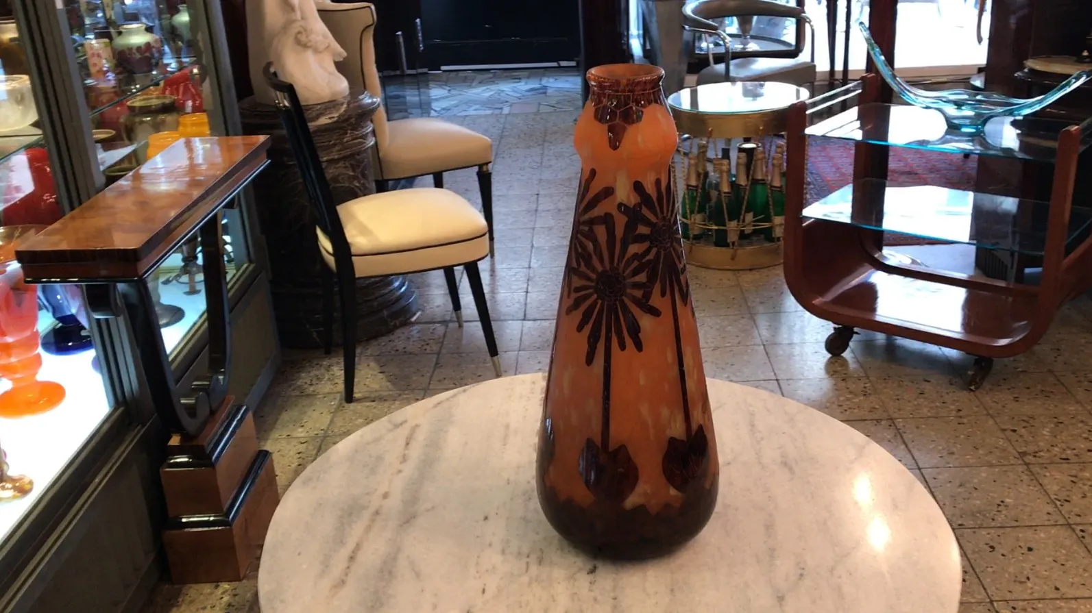 Signed glass with floral patterns, antique setting