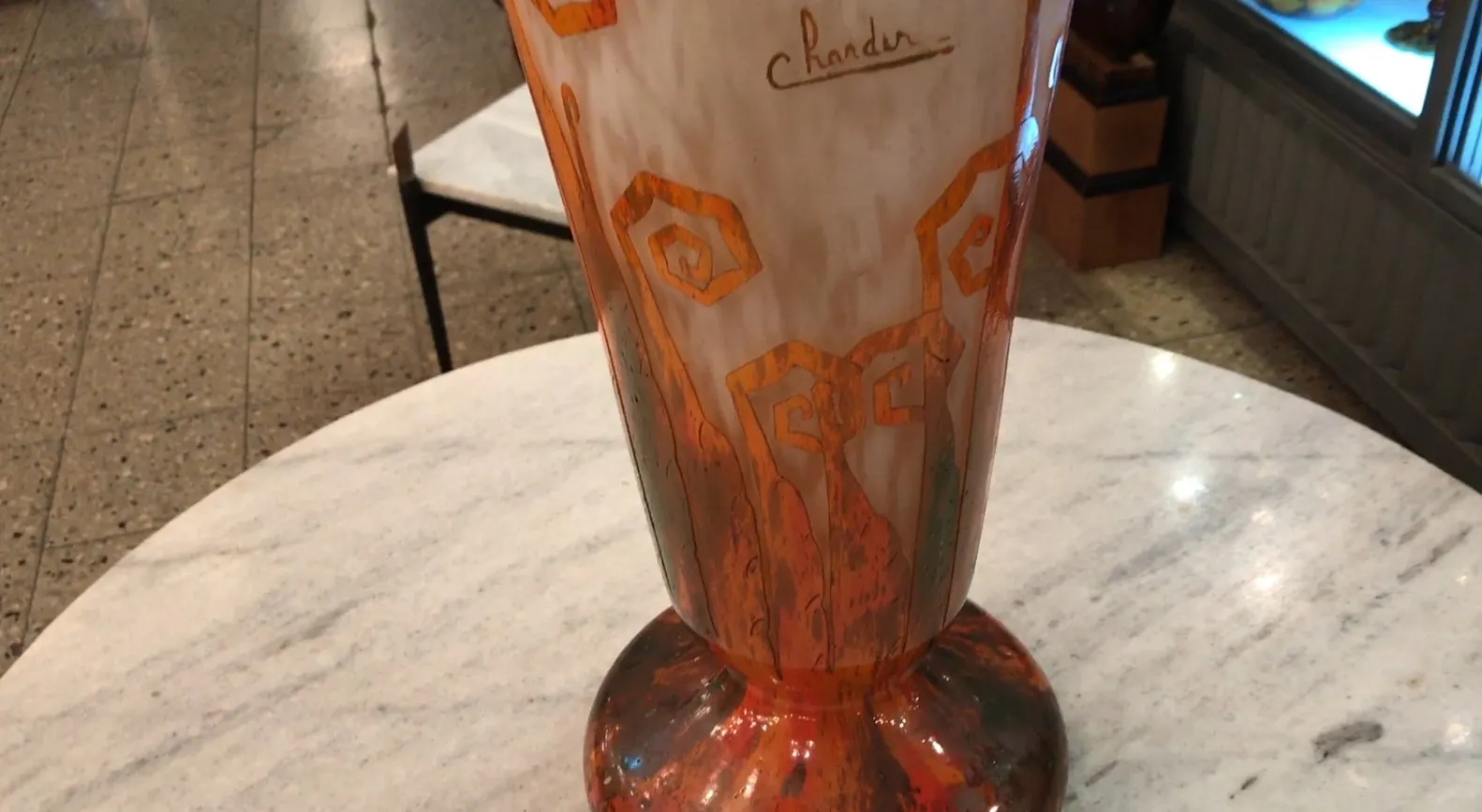 elegant round base, orange and white design, signed Charder