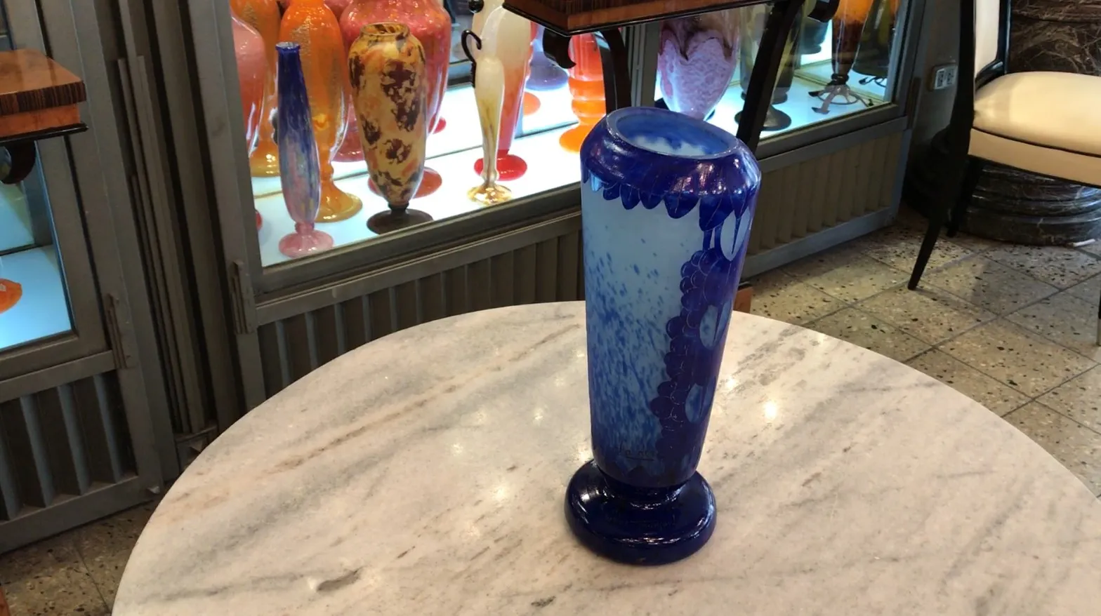 Antique signed glass by Charder featuring blue decorations